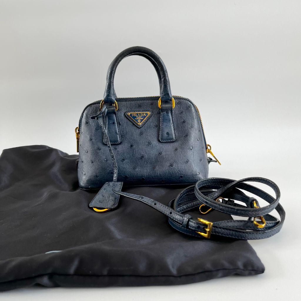 Prada navy blue ostrich leather micro top handle bag