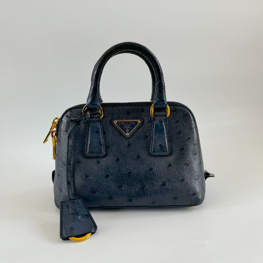 Prada navy blue ostrich leather micro top handle bag