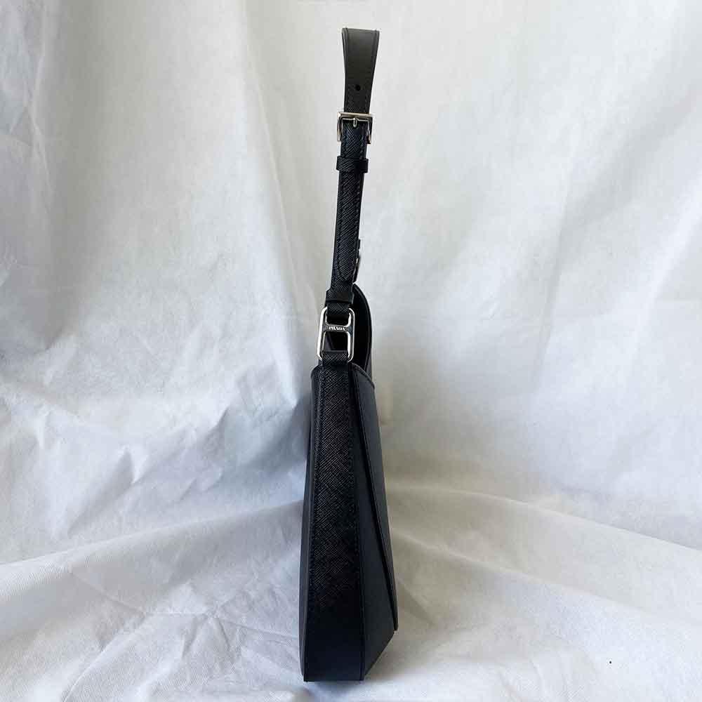 Prada triangle logo cleo bag in saffiano black leather