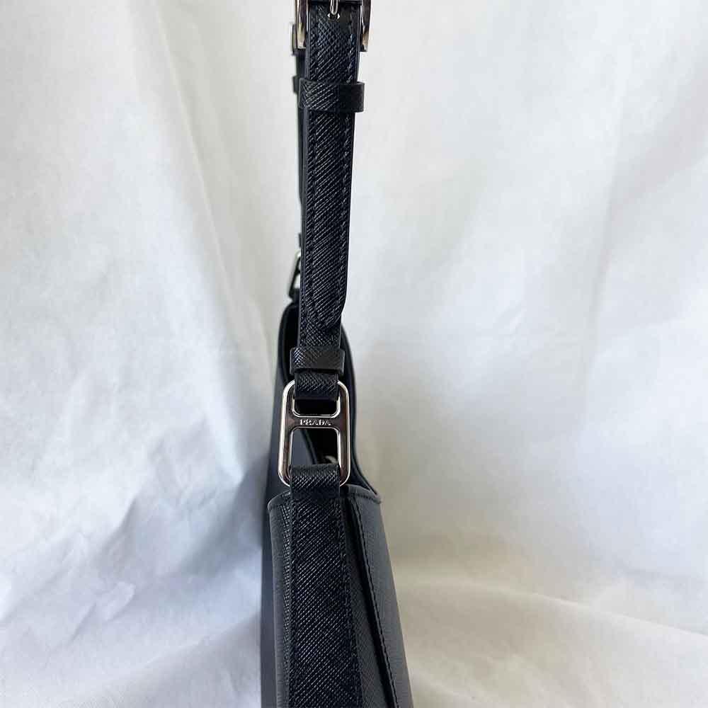 Prada triangle logo cleo bag in saffiano black leather