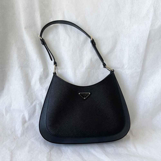 Prada triangle logo cleo bag in saffiano black leather