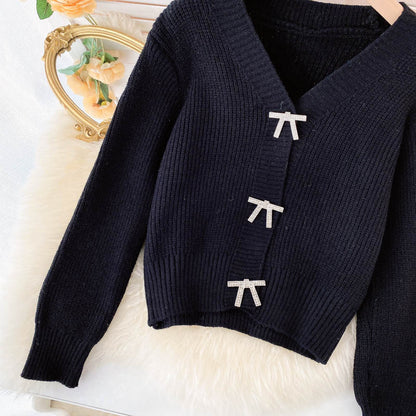 Lovely bow-knot long-sleeved cardigan sweater  138