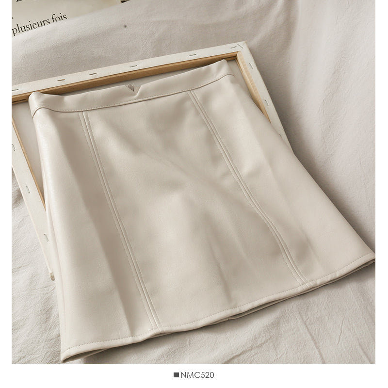 Retro and versatile solid color high waist thin A-shaped small leather skirt  2542