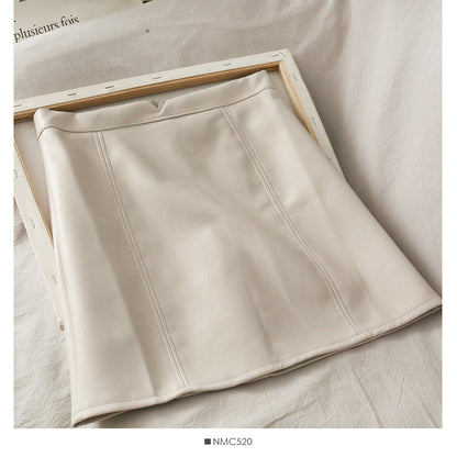 Retro and versatile solid color high waist thin A-shaped small leather skirt  2542
