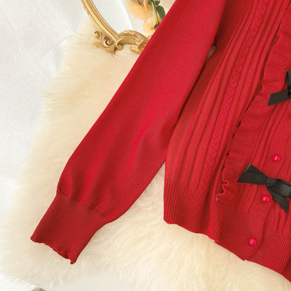 Lovely bow-knot long-sleeved cardigan sweater  010