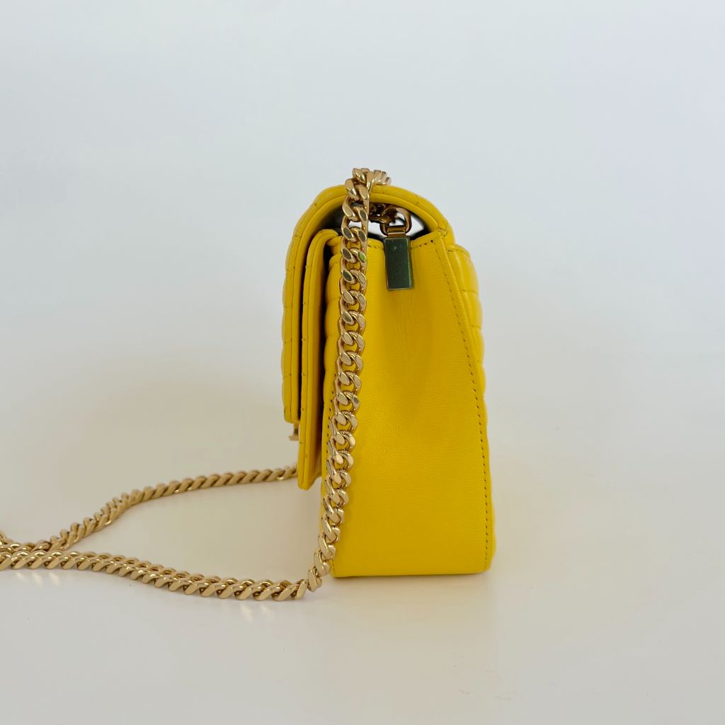 Saint Laurent yellow chevron stitch double flap crossbody bag